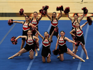 X Out DDC Group Pose X Out Cheer Group