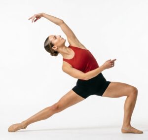 Lyrical Dancer Lyrical Dancer wearing red tank top, black dance shorts, half sole shoes